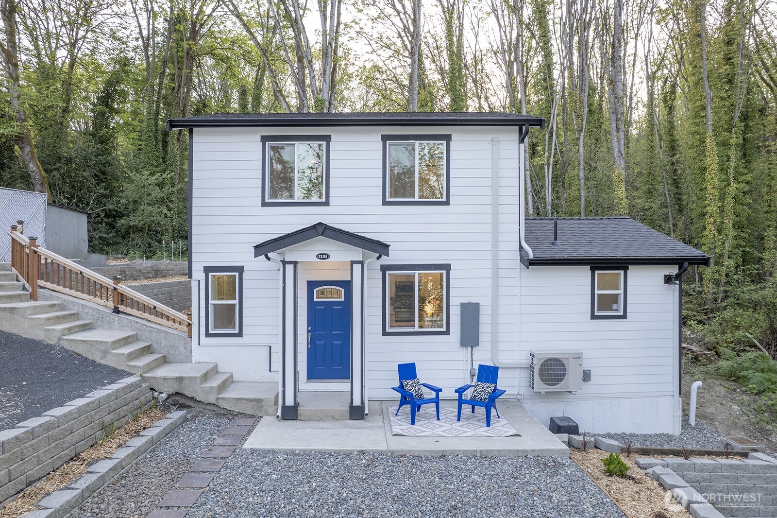 3265 31st Avenue Southwest Seattle, WA 98126 - Photo 1 of 18 a view of a house with a patio
