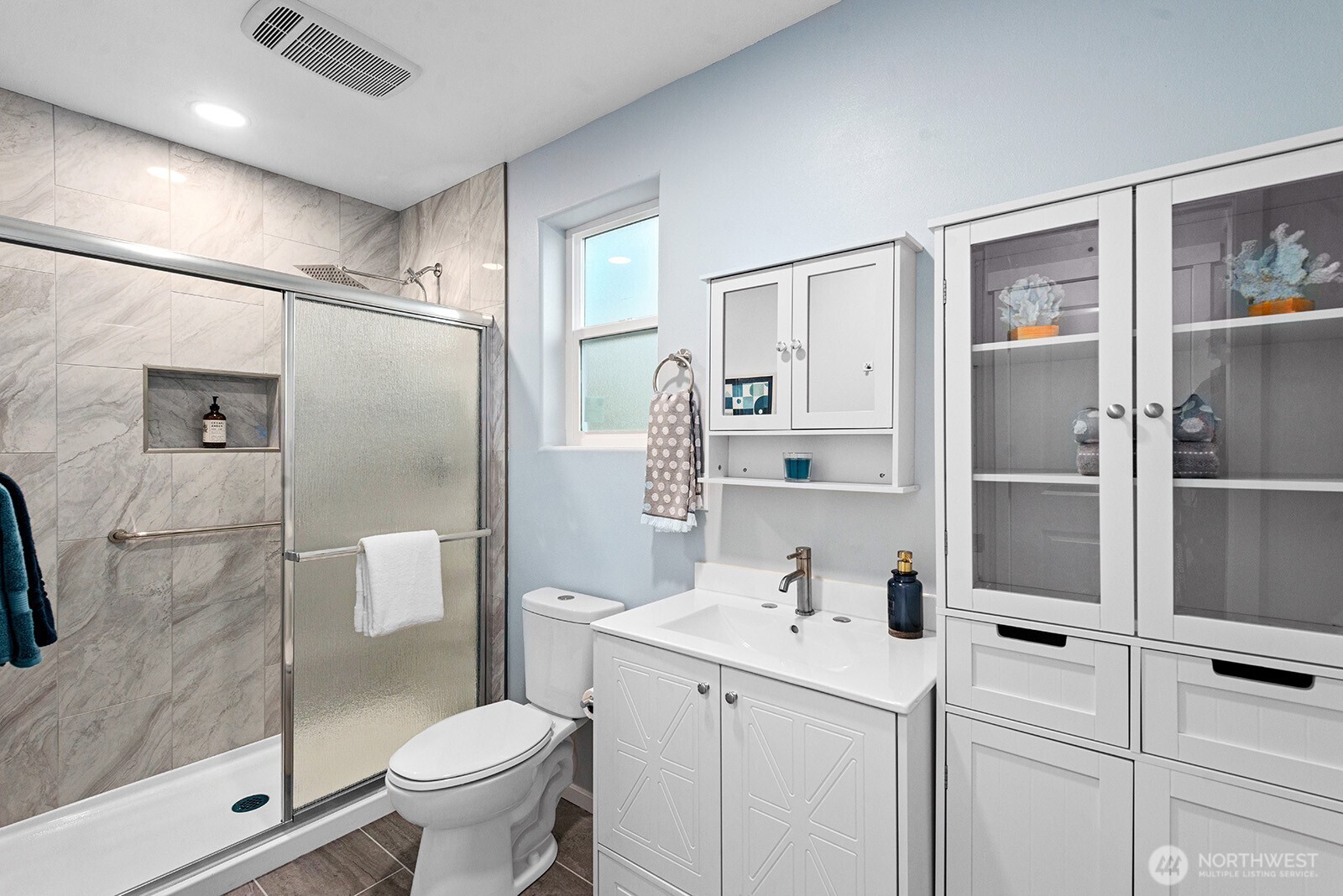 3265 31st Avenue Southwest Seattle, WA 98126 - Photo 15 of 18 a bathroom with a sink toilet and shower