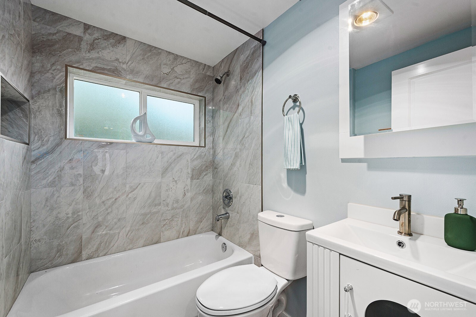 3265 31st Avenue Southwest Seattle, WA 98126 - Photo 16 of 18 a bathroom with a sink toilet and shower