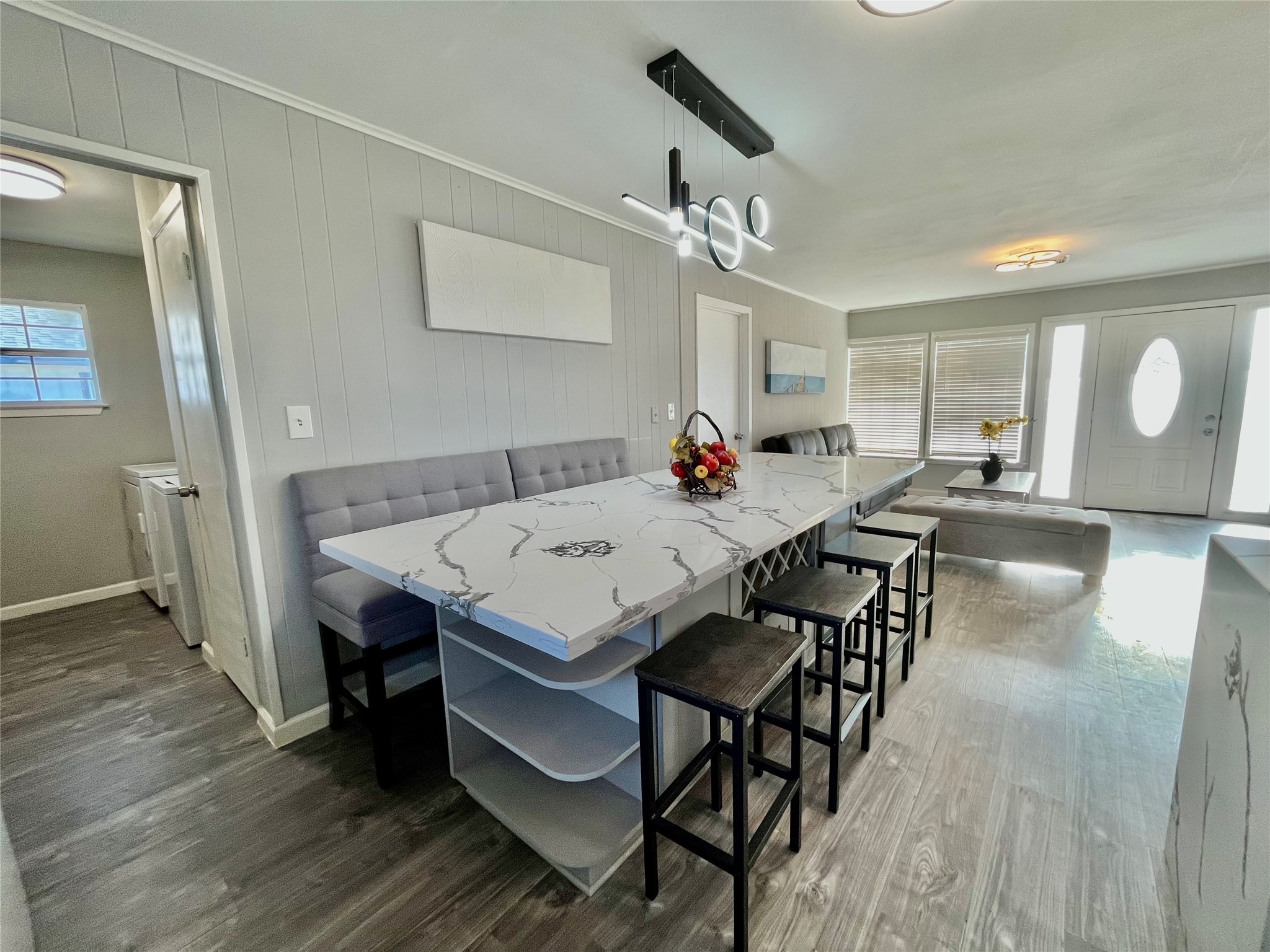 610 Seashell Drive Surfside Beach, TX 77541 - Photo 15 of 42 a view of a dining room with furniture and wooden floor