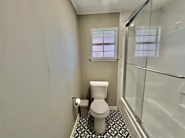 a front view of house with yard outdoor seating and barbeque oven