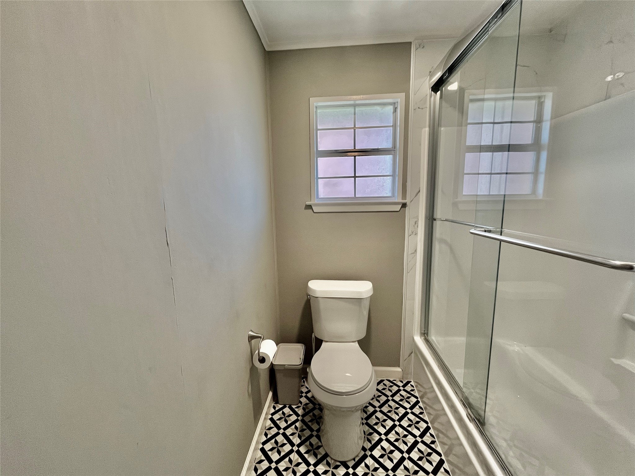 610 Seashell Drive Surfside Beach, TX 77541 - Photo 29 of 42 a bathroom with a toilet and a shower
