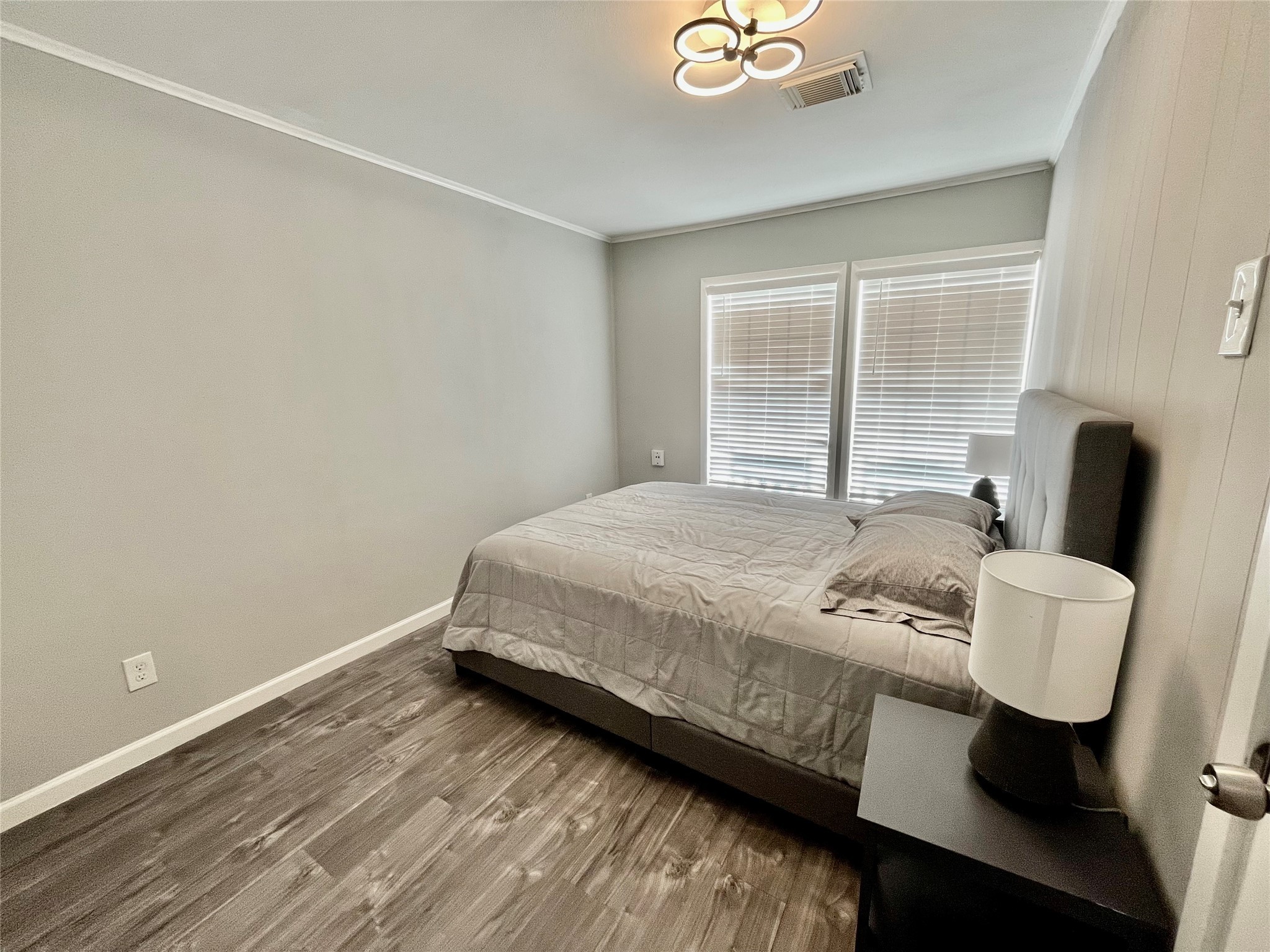 610 Seashell Drive Surfside Beach, TX 77541 - Photo 36 of 42 a bedroom with a bed and a window