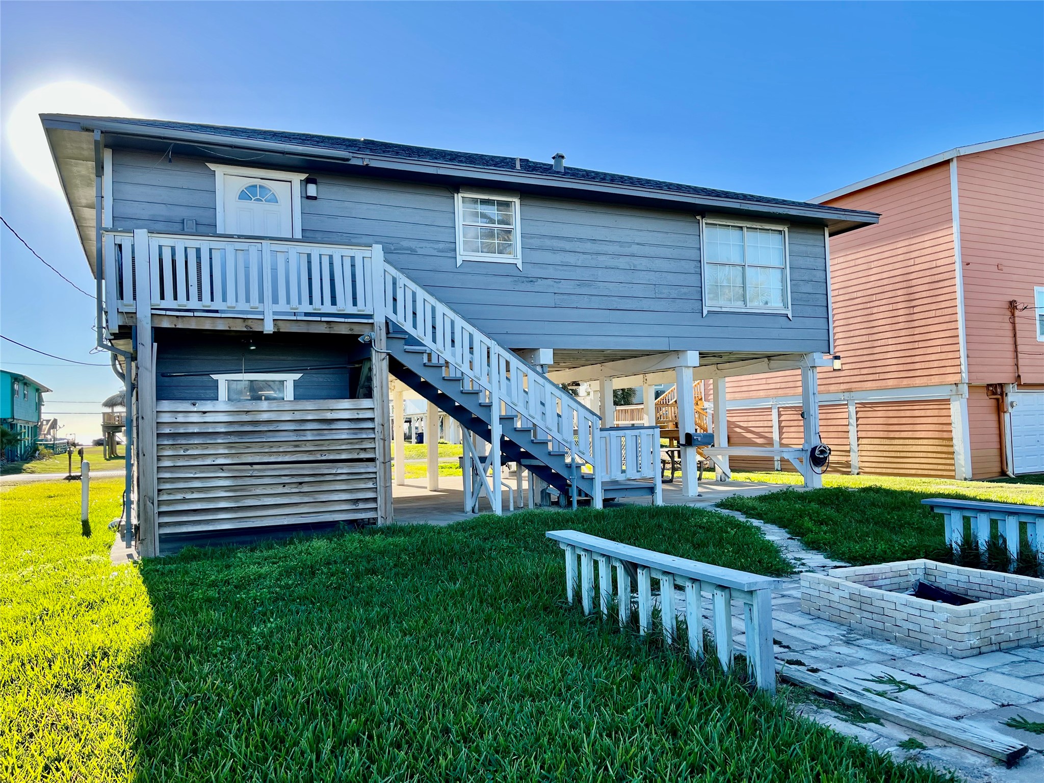 610 Seashell Drive Surfside Beach, TX 77541 - Photo 39 of 42 a view of a house with a yard