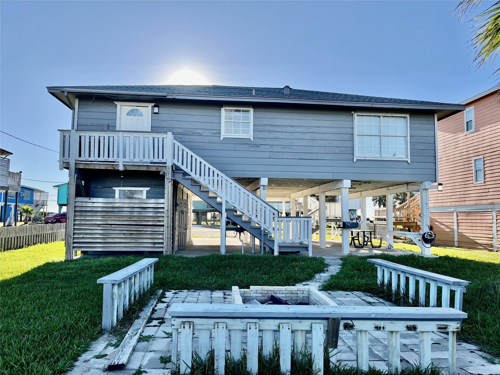 610 Seashell Drive Surfside Beach, TX 77541 - Photo 40 of 42 a front view of house with yard outdoor seating and barbeque oven