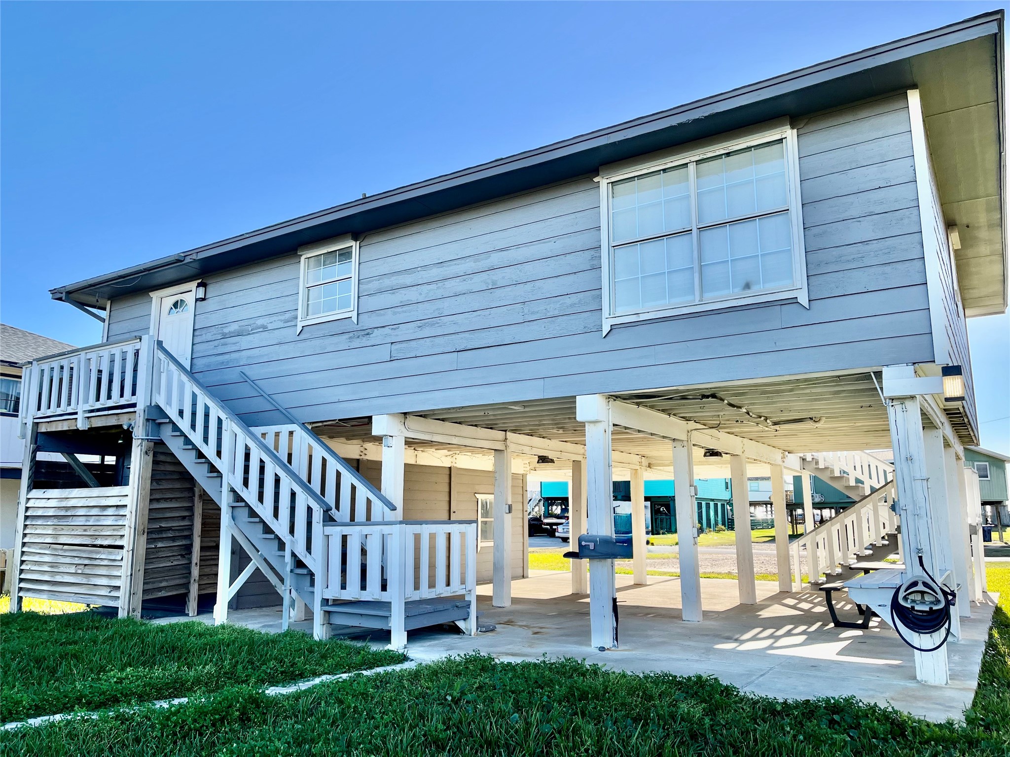610 Seashell Drive Surfside Beach, TX 77541 - Photo 41 of 42 a view of a house with backyard and porch