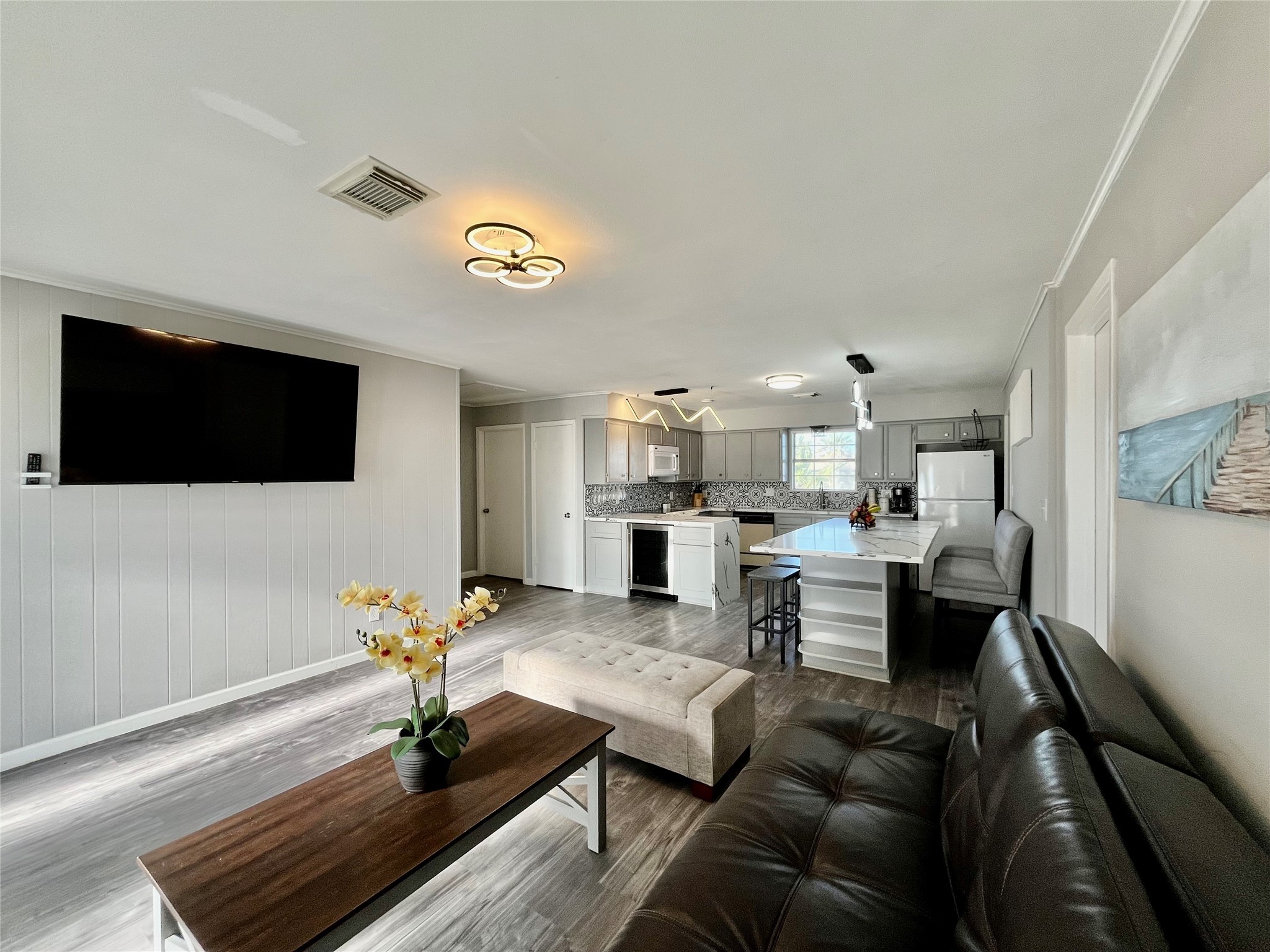 610 Seashell Drive Surfside Beach, TX 77541 - Photo 8 of 42 a living room with furniture and a flat screen tv