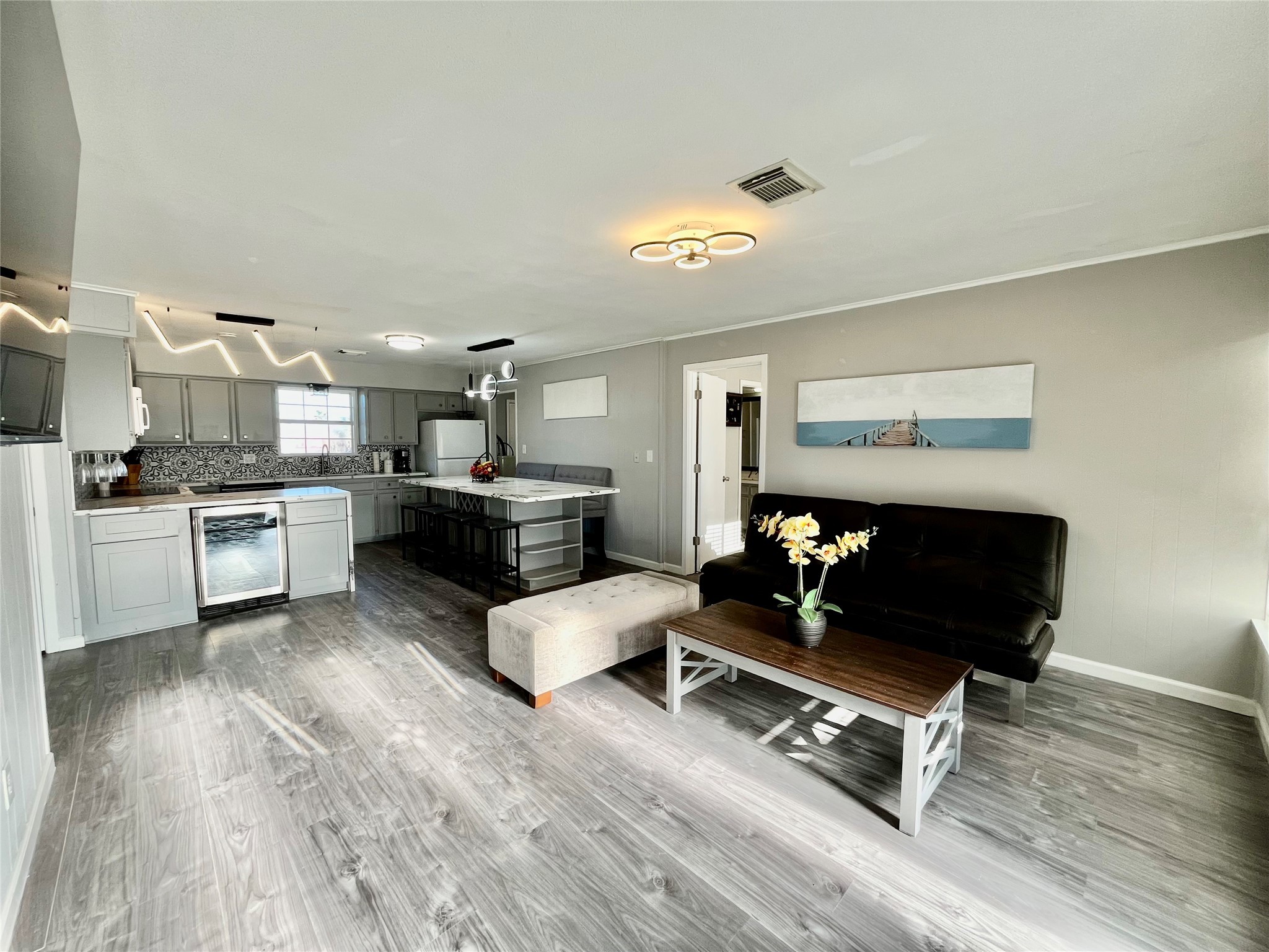 610 Seashell Drive Surfside Beach, TX 77541 - Photo 9 of 42 a living room with furniture and kitchen view