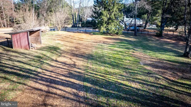 a kitchen with cabinets appliances a sink and a window