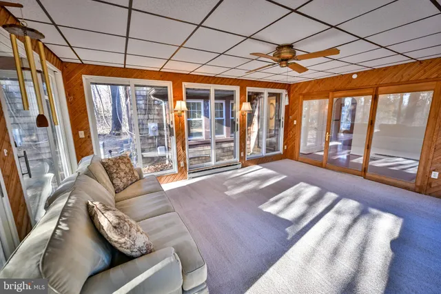 a large kitchen with stainless steel appliances granite countertop a stove a sink and a refrigerator