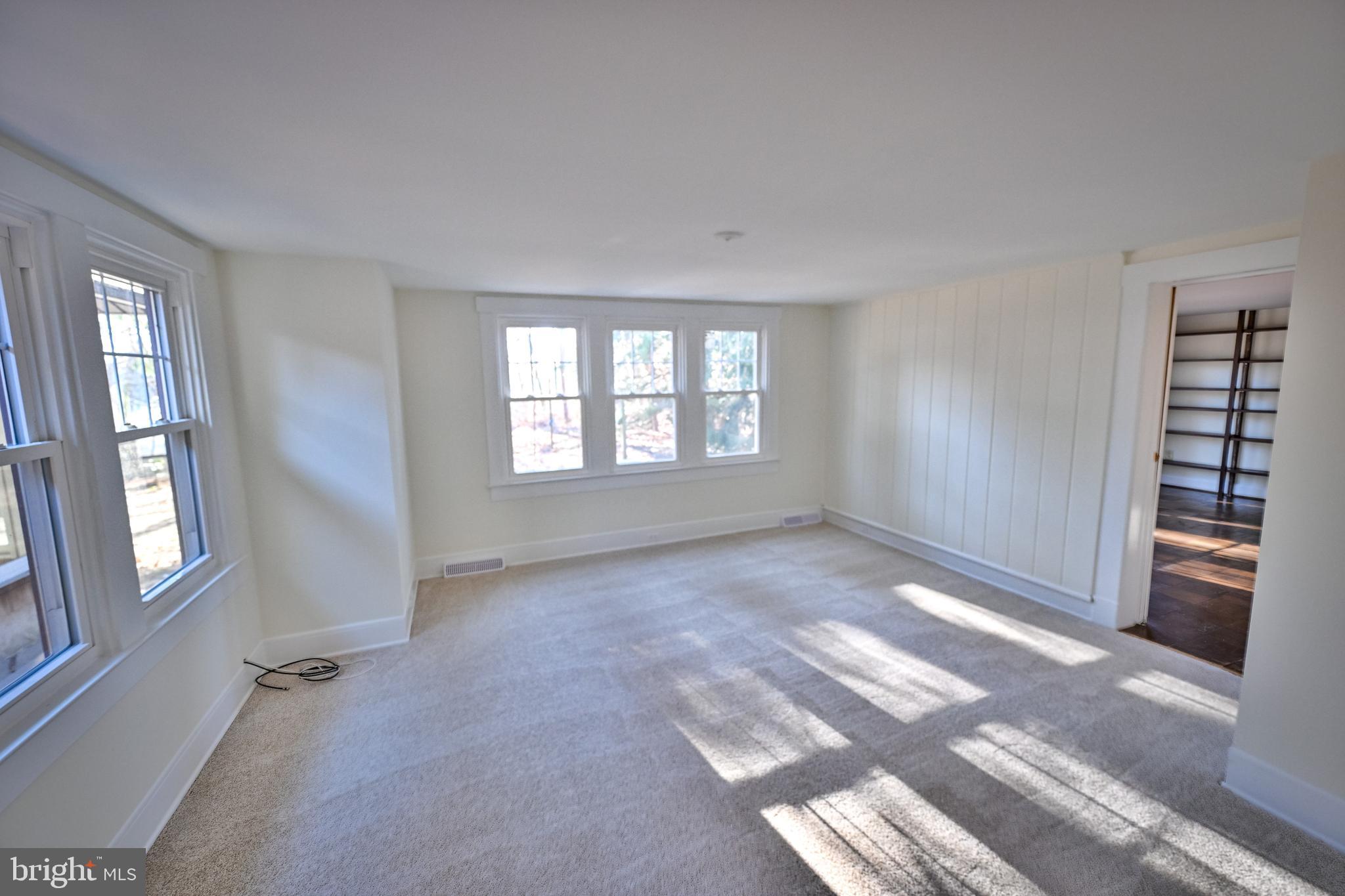 12116 Jerusalem Road Kingsville, MD 21087 - Photo 53 of 76 Living Room, door on right to Primary Bedroom