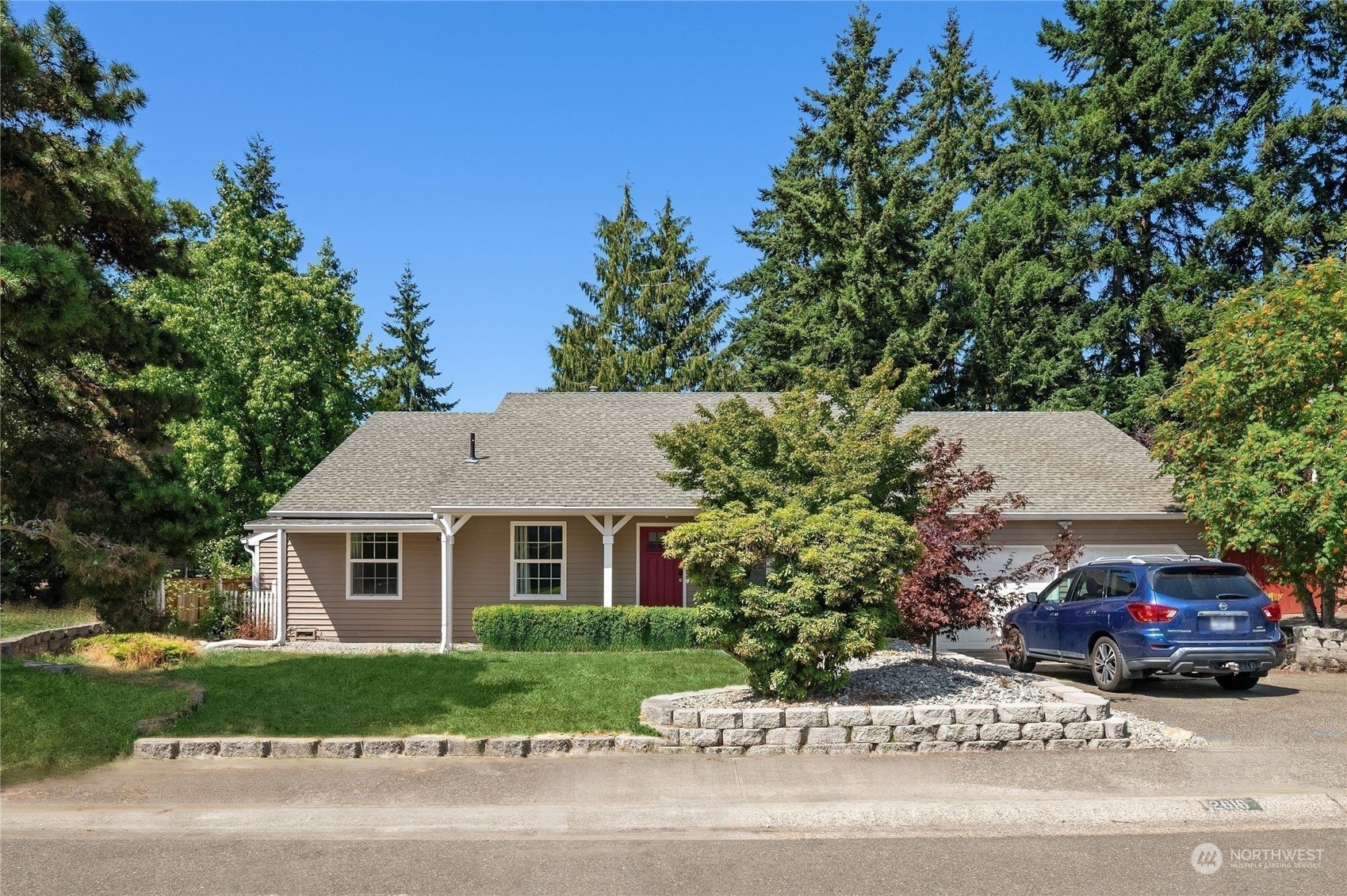 a house view with a garden space