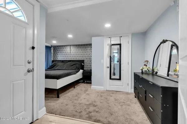 a living room with furniture and a gate