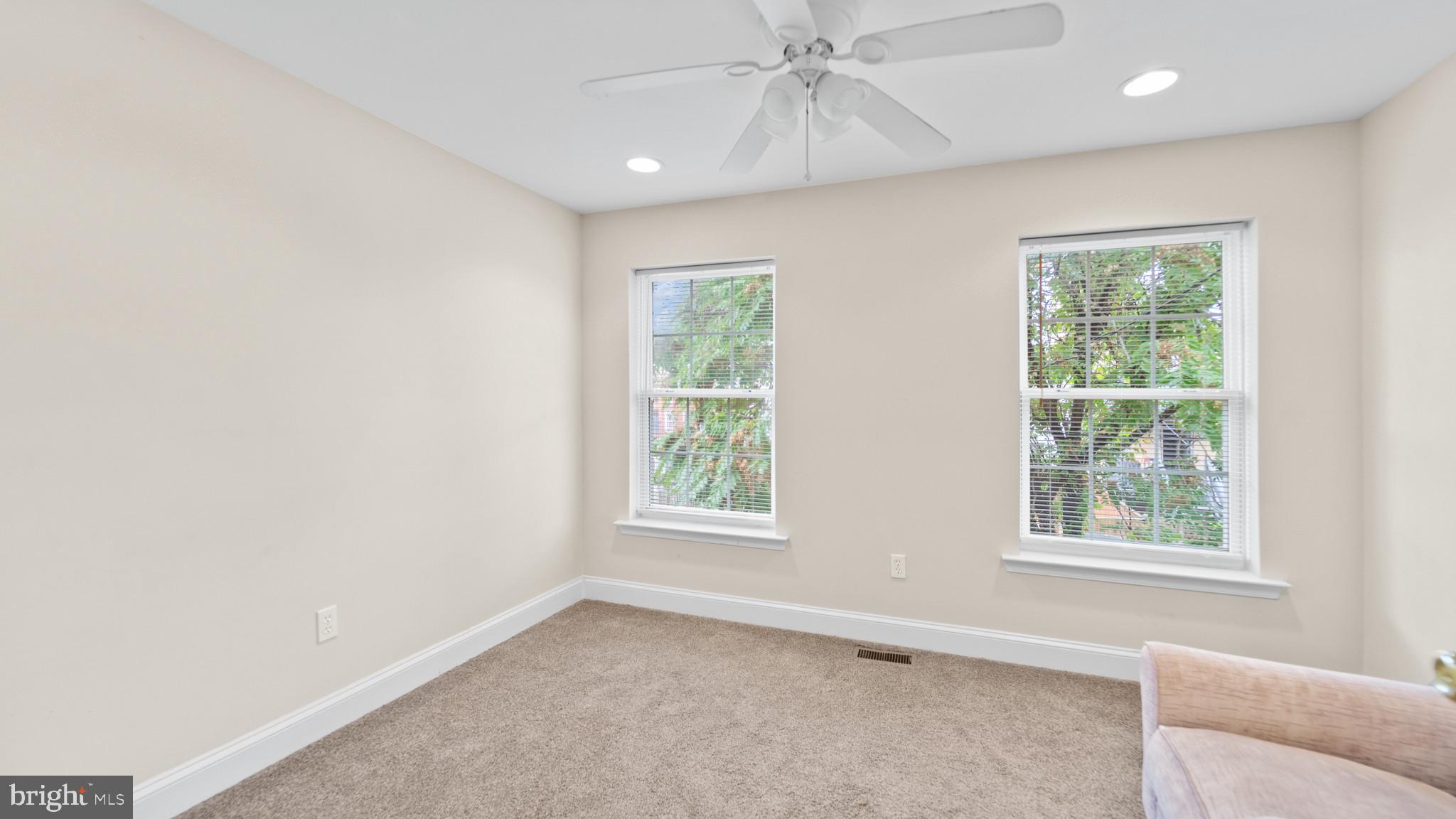 628 Scott Street Baltimore, MD 21230 - Photo 11 of 33 an empty room with windows and fan