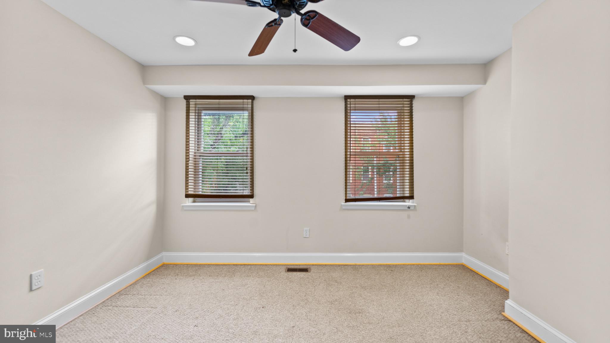 628 Scott Street Baltimore, MD 21230 - Photo 13 of 33 an empty room with a window and ceiling fan