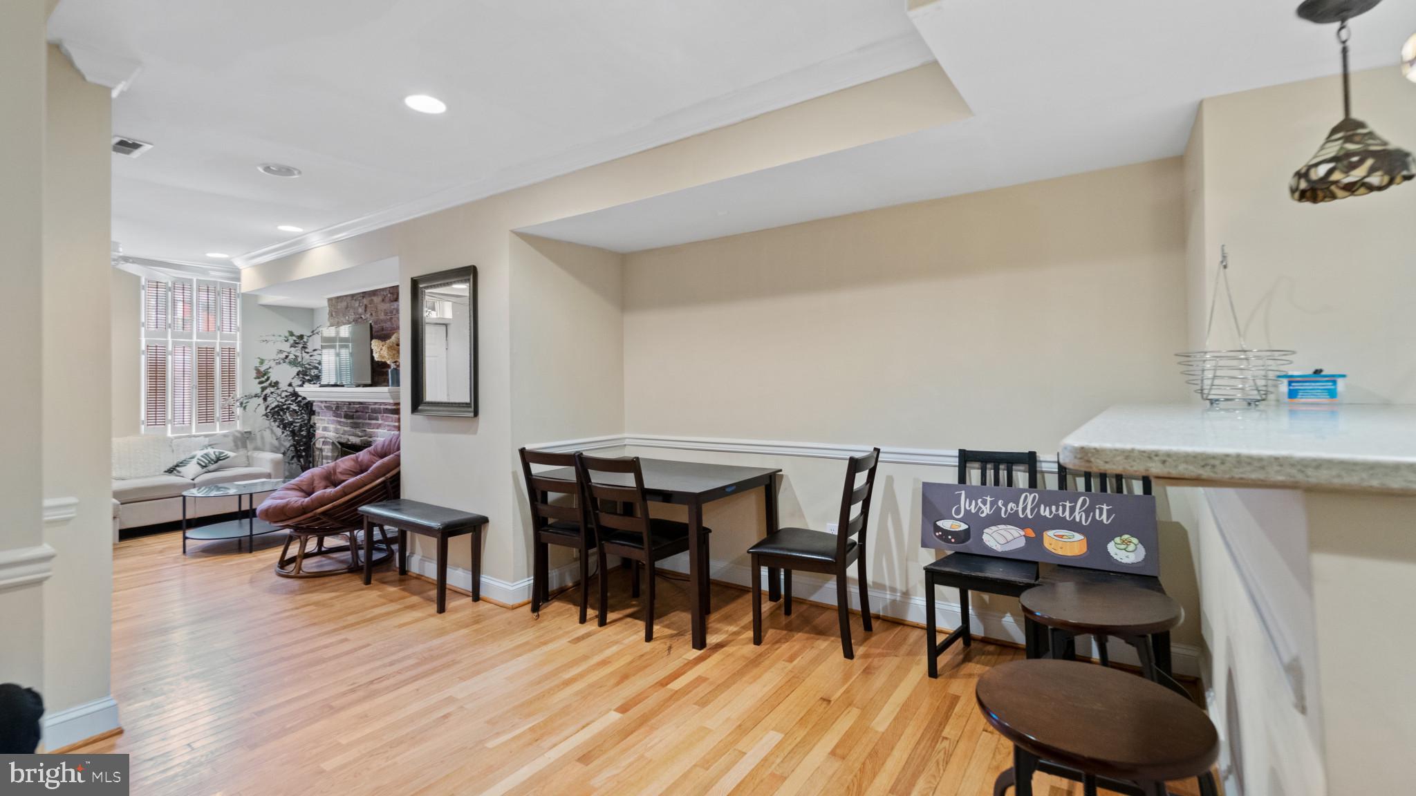 628 Scott Street Baltimore, MD 21230 - Photo 6 of 33 a view of a dining room with furniture and wooden floor