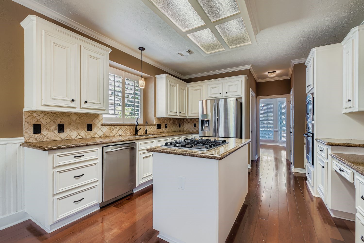 17415 Aspen Oak Court Spring, TX 77379 - Photo 13 of 39 a kitchen with stainless steel appliances granite countertop a stove and a refrigerator