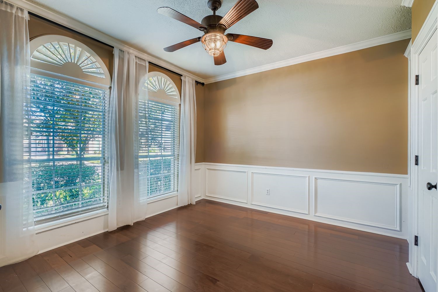 17415 Aspen Oak Court Spring, TX 77379 - Photo 17 of 39 a view of an empty room with a window and wooden floor