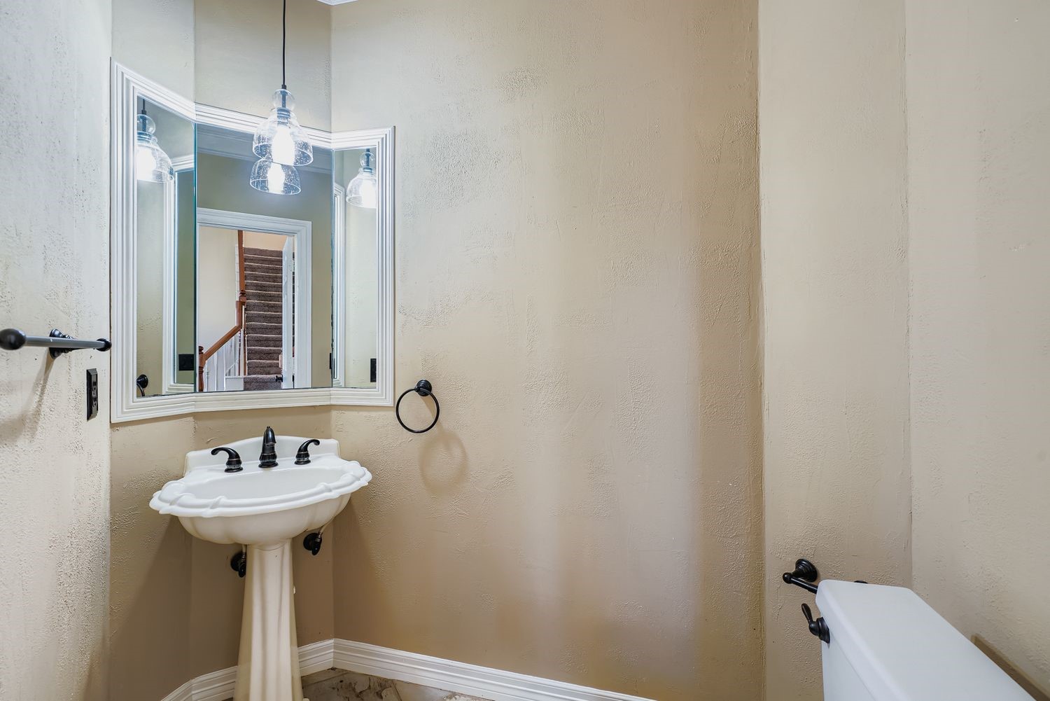 17415 Aspen Oak Court Spring, TX 77379 - Photo 20 of 39 a bathroom with a sink a toilet and mirror