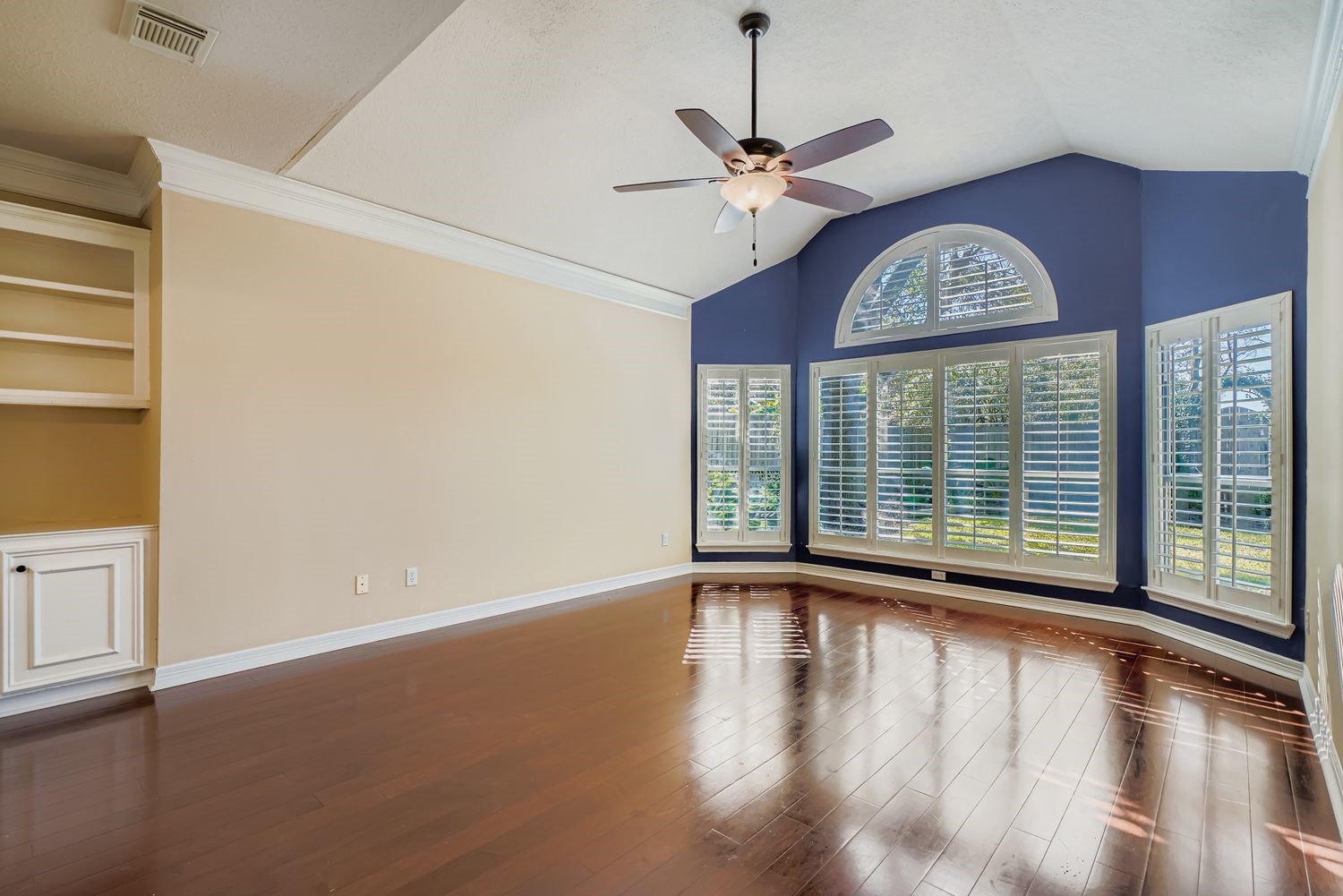17415 Aspen Oak Court Spring, TX 77379 - Photo 21 of 39 a view of an empty room with a window and wooden floor
