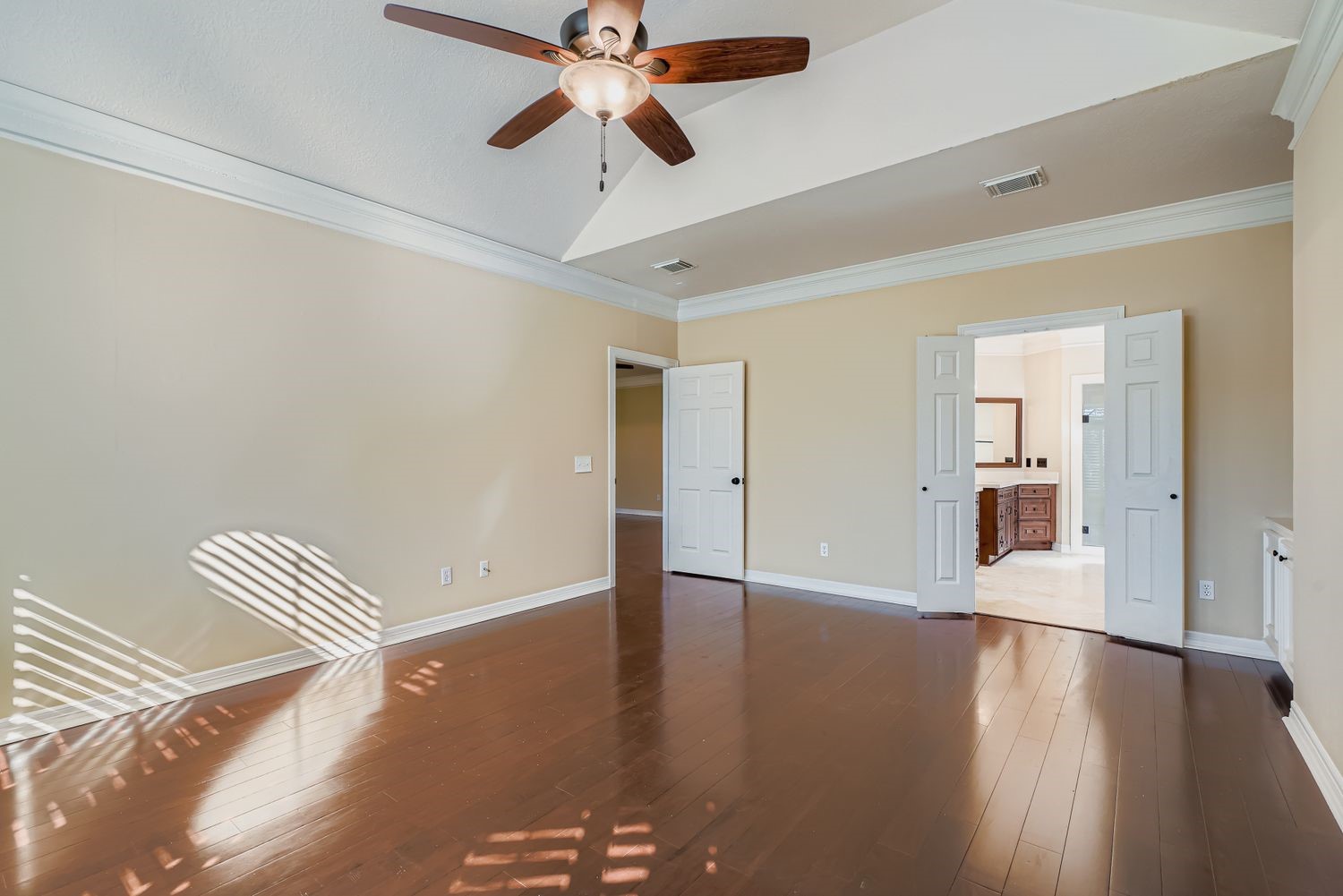 17415 Aspen Oak Court Spring, TX 77379 - Photo 23 of 39 an empty room with wooden floor fan and windows