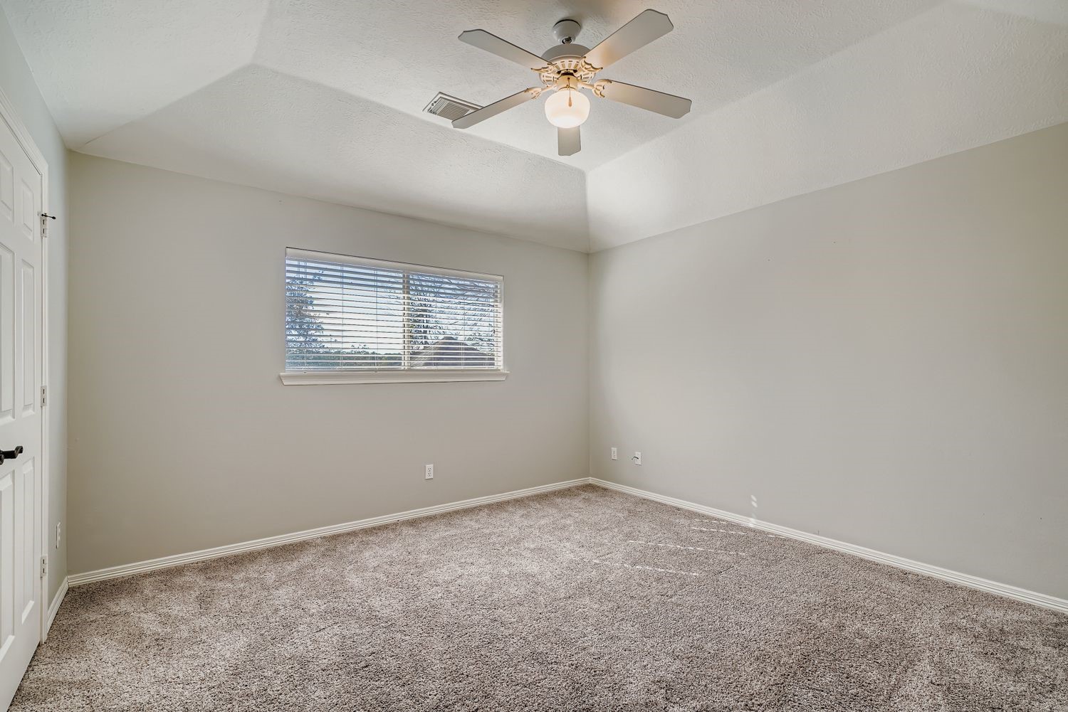 17415 Aspen Oak Court Spring, TX 77379 - Photo 27 of 39 an empty room with a window and a fan