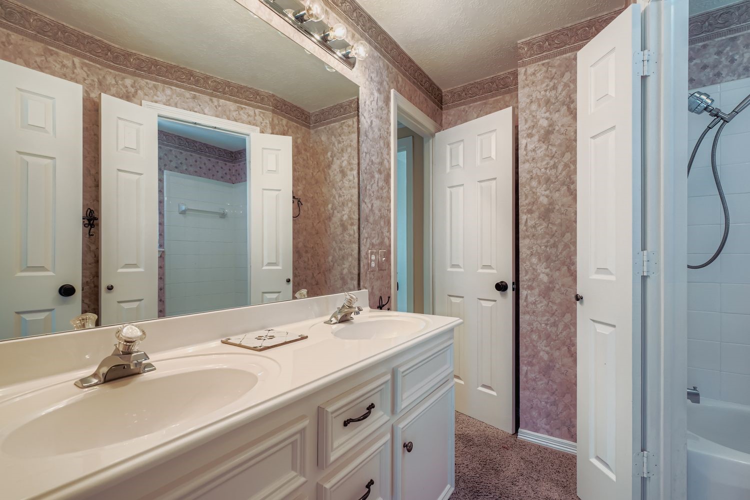 17415 Aspen Oak Court Spring, TX 77379 - Photo 31 of 39 a bathroom with a double vanity sink mirror and double