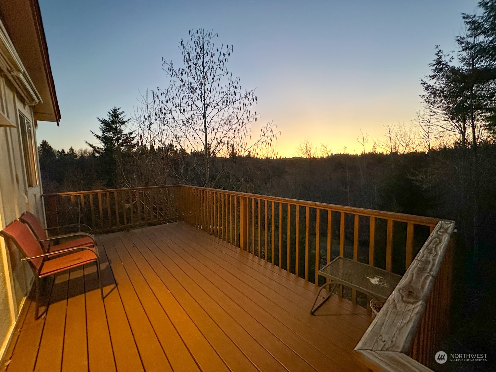 11243 Langworthy Road Southwest Rochester, WA 98579 - Photo 34 of 40 a view of deck with wooden floor and outdoor seating