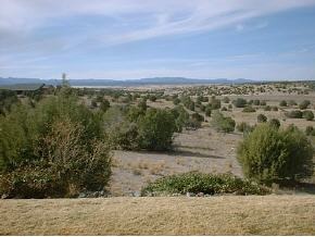 17300 Crossroads Ranch Road, Unit 63B Prescott, AZ 86305 - Photo 6 of 8 an aerial view of mountain with trees
