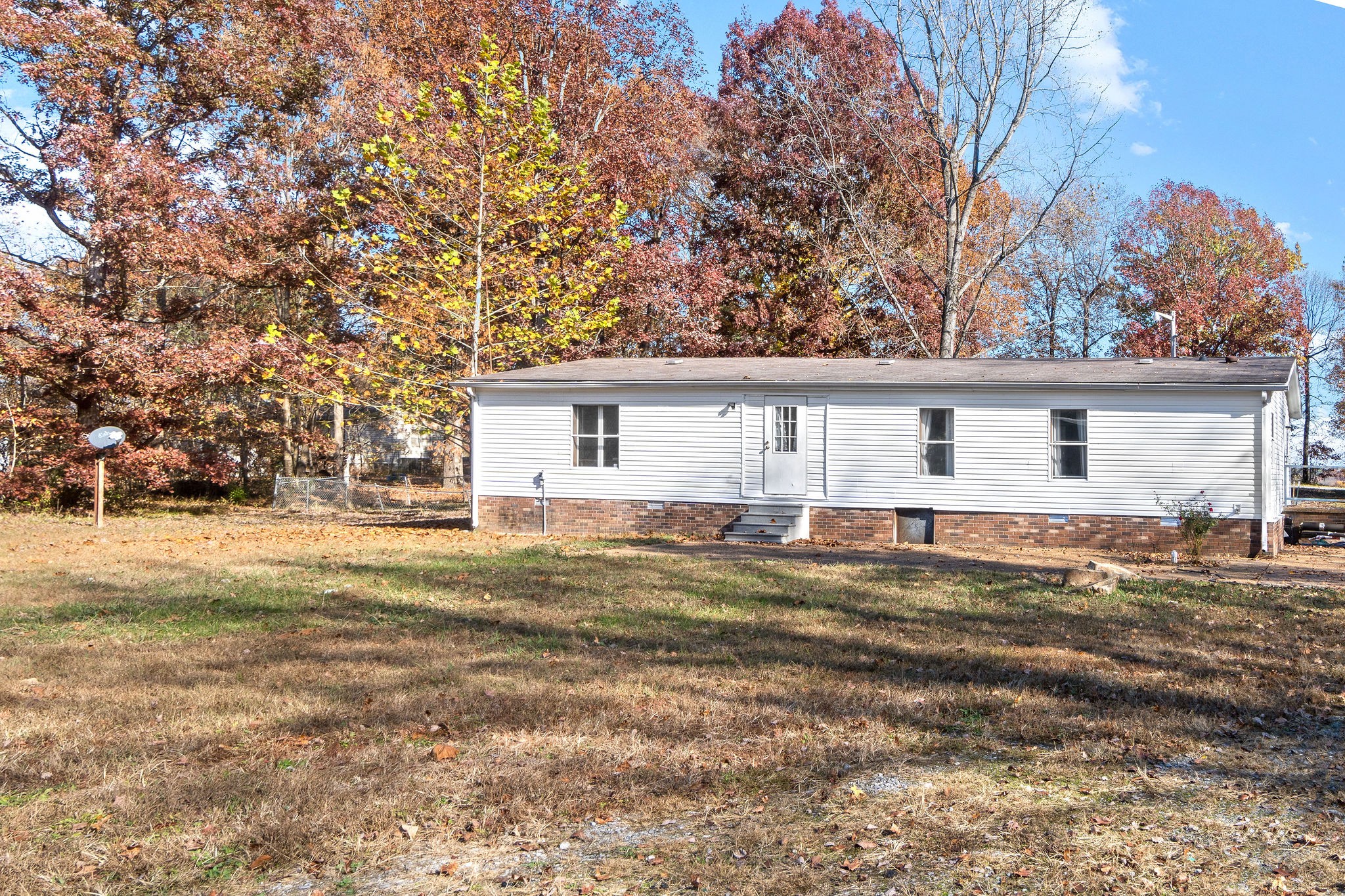 5820 Fred Perry Road Springfield, TN 37172 - Photo 10 of 33 a view of a house with a backyard and a tree
