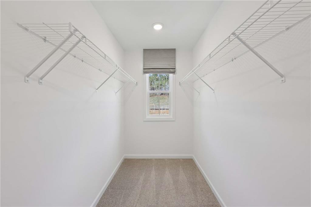 6205 Kismet Road Buford, GA 30518 - Photo 29 of 43 a view of hallway with window