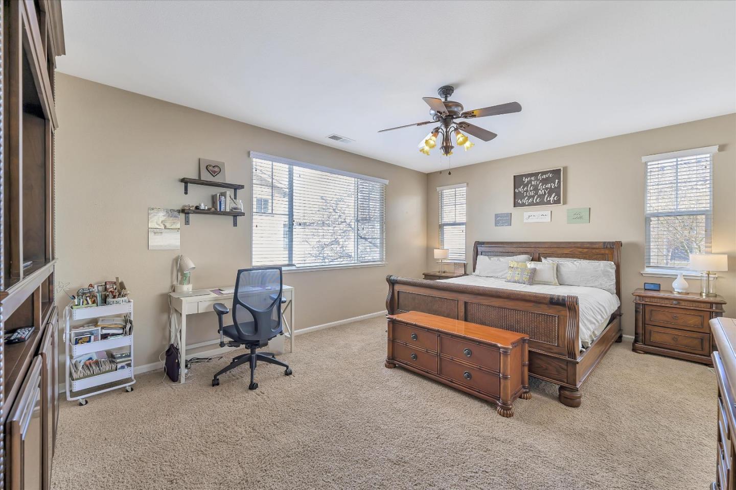 7522 Edinburgh Way Gilroy, CA 95020 - Photo 18 of 31 a bed room with a bed and a chair