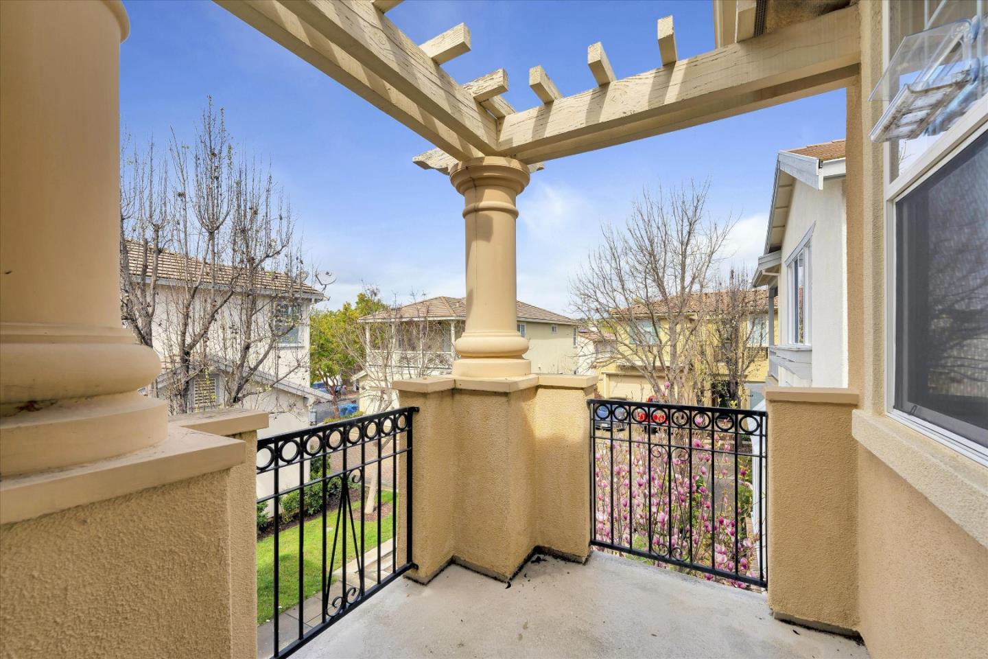 7522 Edinburgh Way Gilroy, CA 95020 - Photo 23 of 31 a front view of a house with a fountain