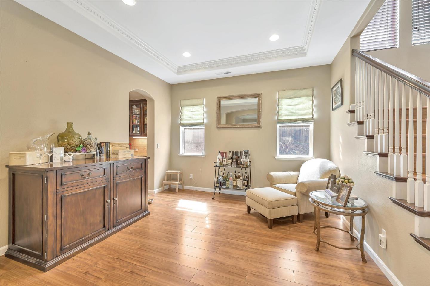 7522 Edinburgh Way Gilroy, CA 95020 - Photo 6 of 31 a living room with furniture and wooden floor