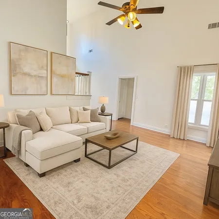 a view of a swimming pool with a lounge chairs