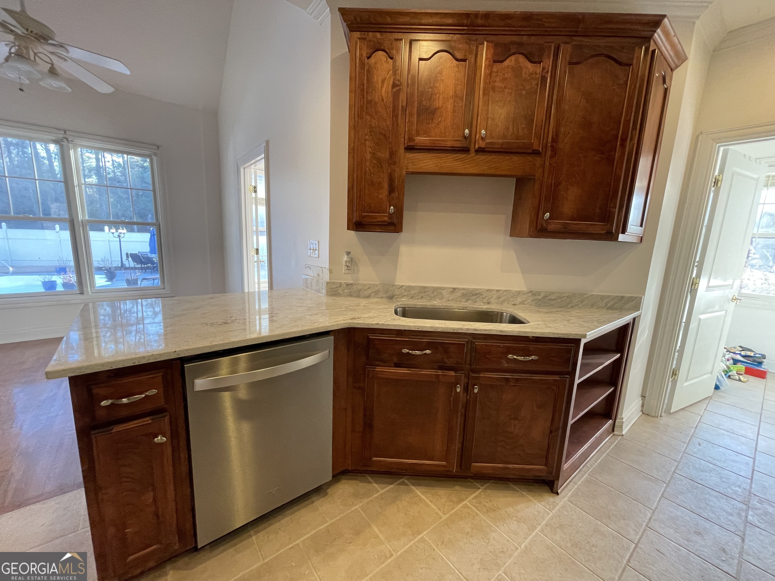 155 Rocky Way Williamson, GA 30292 - Photo 28 of 56 a kitchen with a sink and a mirror