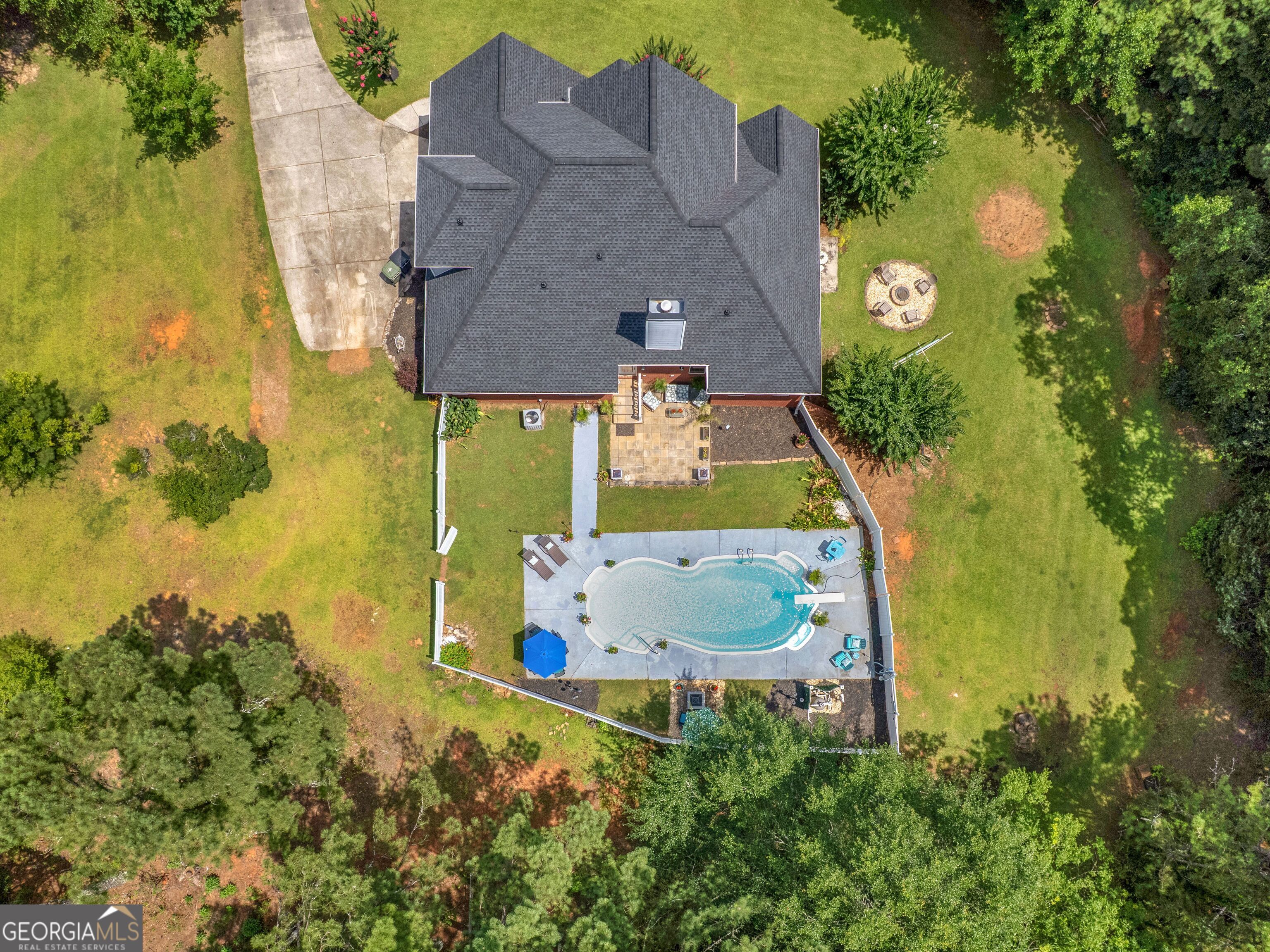 155 Rocky Way Williamson, GA 30292 - Photo 3 of 56 an aerial view of residential house with swimming pool