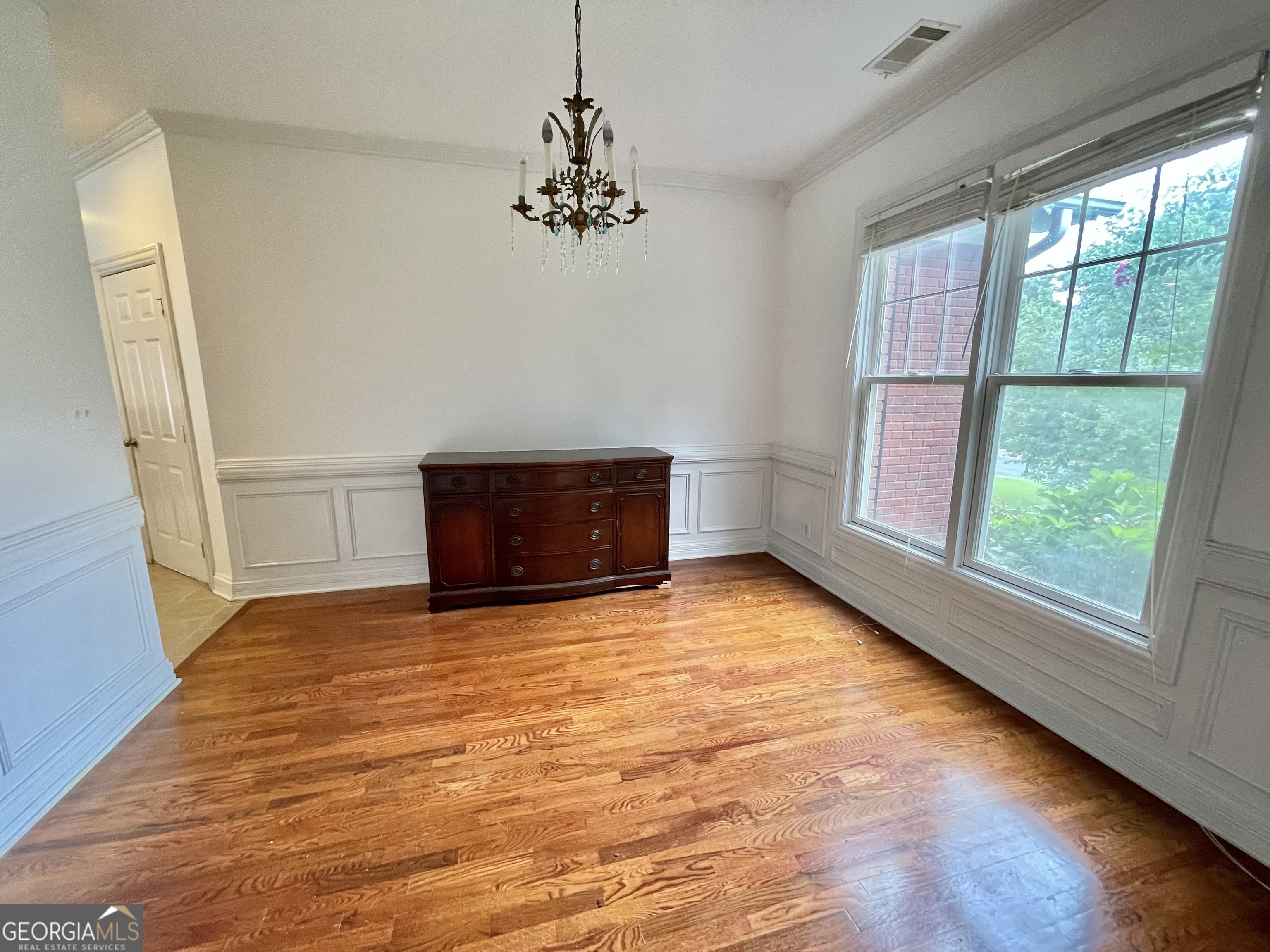 155 Rocky Way Williamson, GA 30292 - Photo 36 of 56 a view of empty room with wooden floor and fan