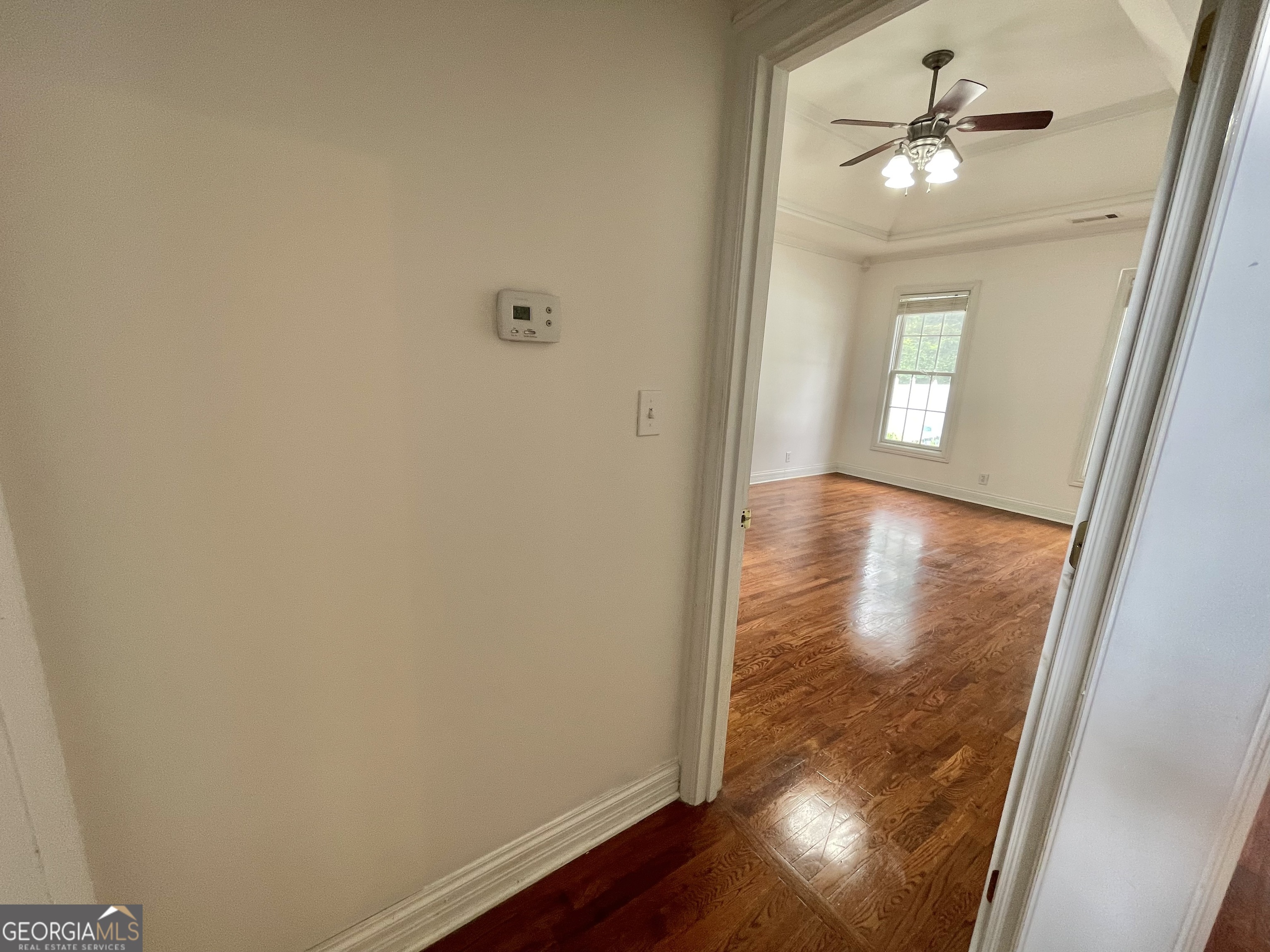 155 Rocky Way Williamson, GA 30292 - Photo 47 of 56 wooden floor in an empty room with a window