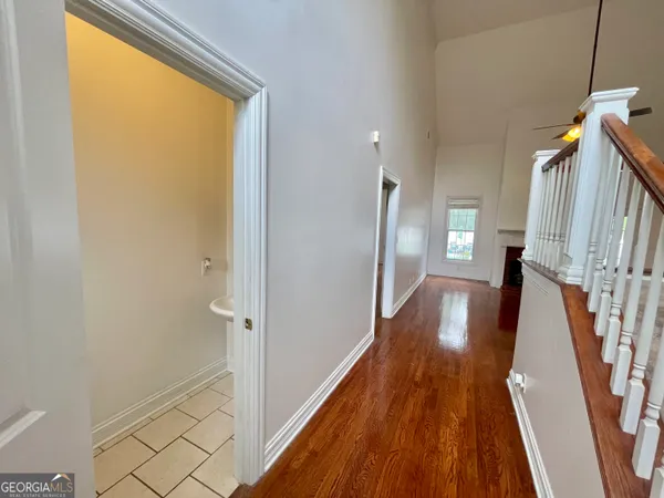 a view of an empty room with a balcony