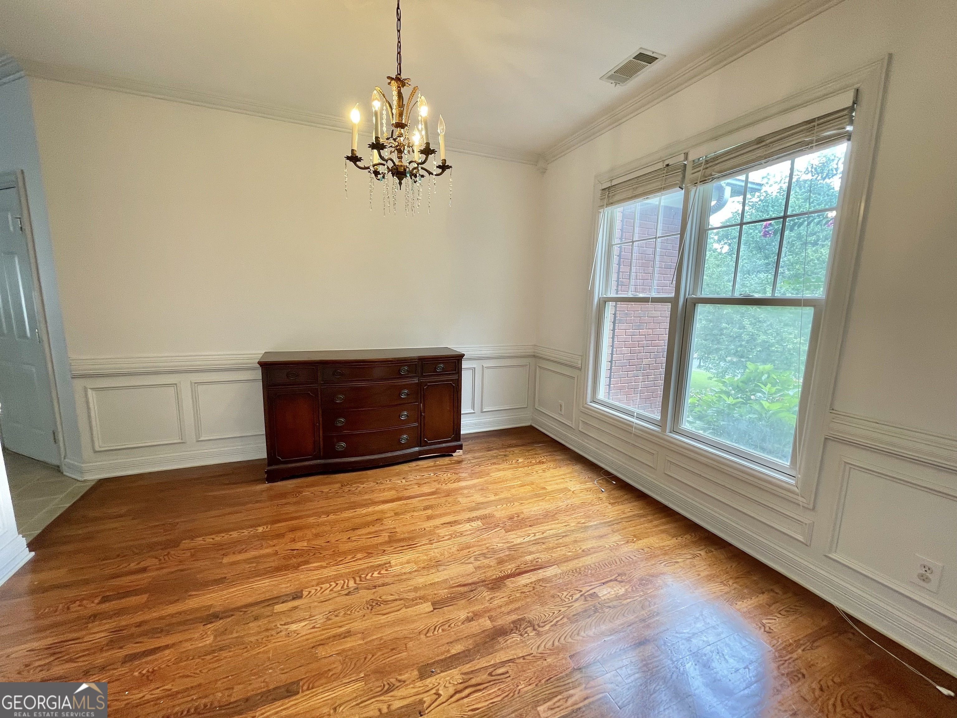 155 Rocky Way Williamson, GA 30292 - Photo 52 of 56 a view of empty room with wooden floor and fan