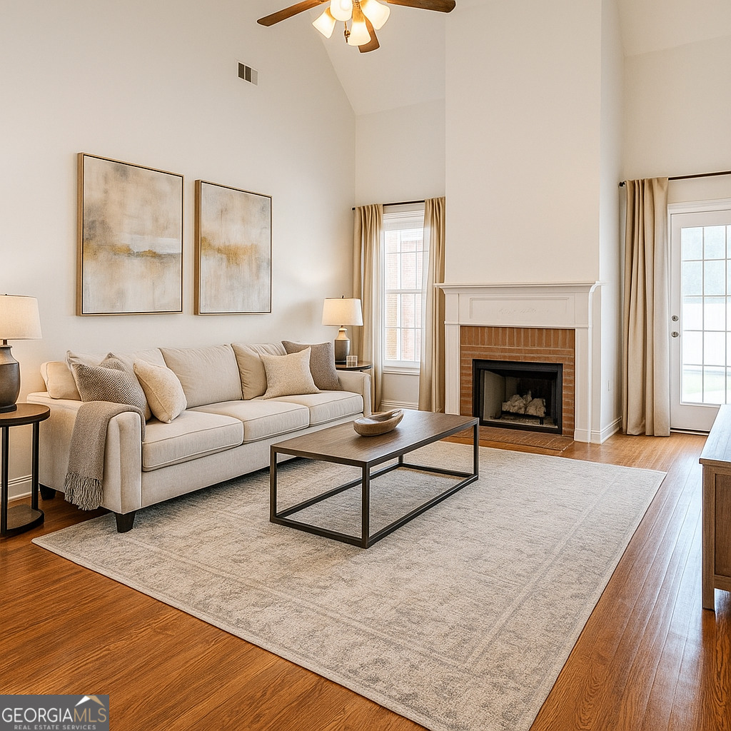 155 Rocky Way Williamson, GA 30292 - Photo 6 of 56 a living room with furniture and a fireplace