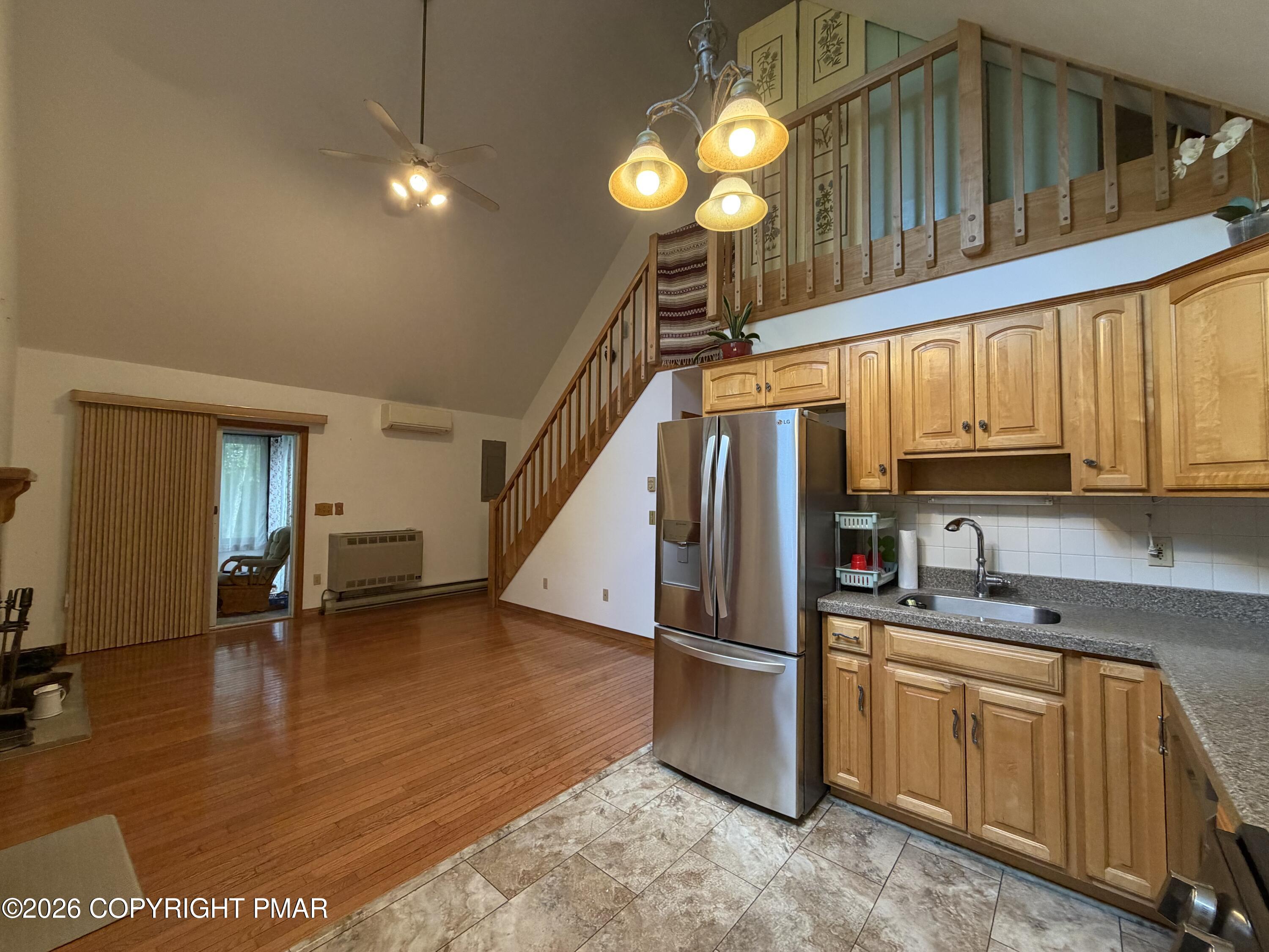 197 Hummingbird Trail Bushkill, PA 18324 - Photo 8 of 33 Kitchen& Living Room