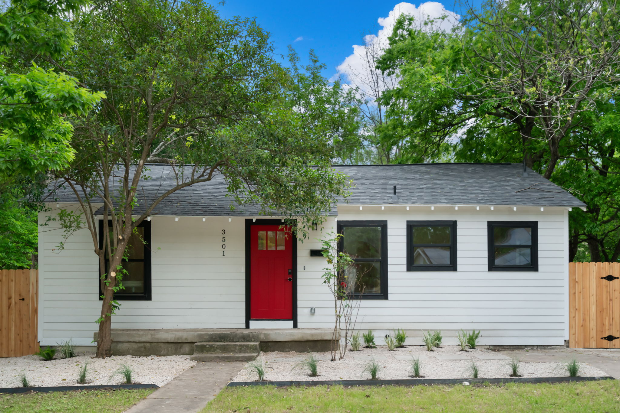 3501 Grayson Lane Austin, TX 78722 - Photo 1 of 23 a front view of a house with garden