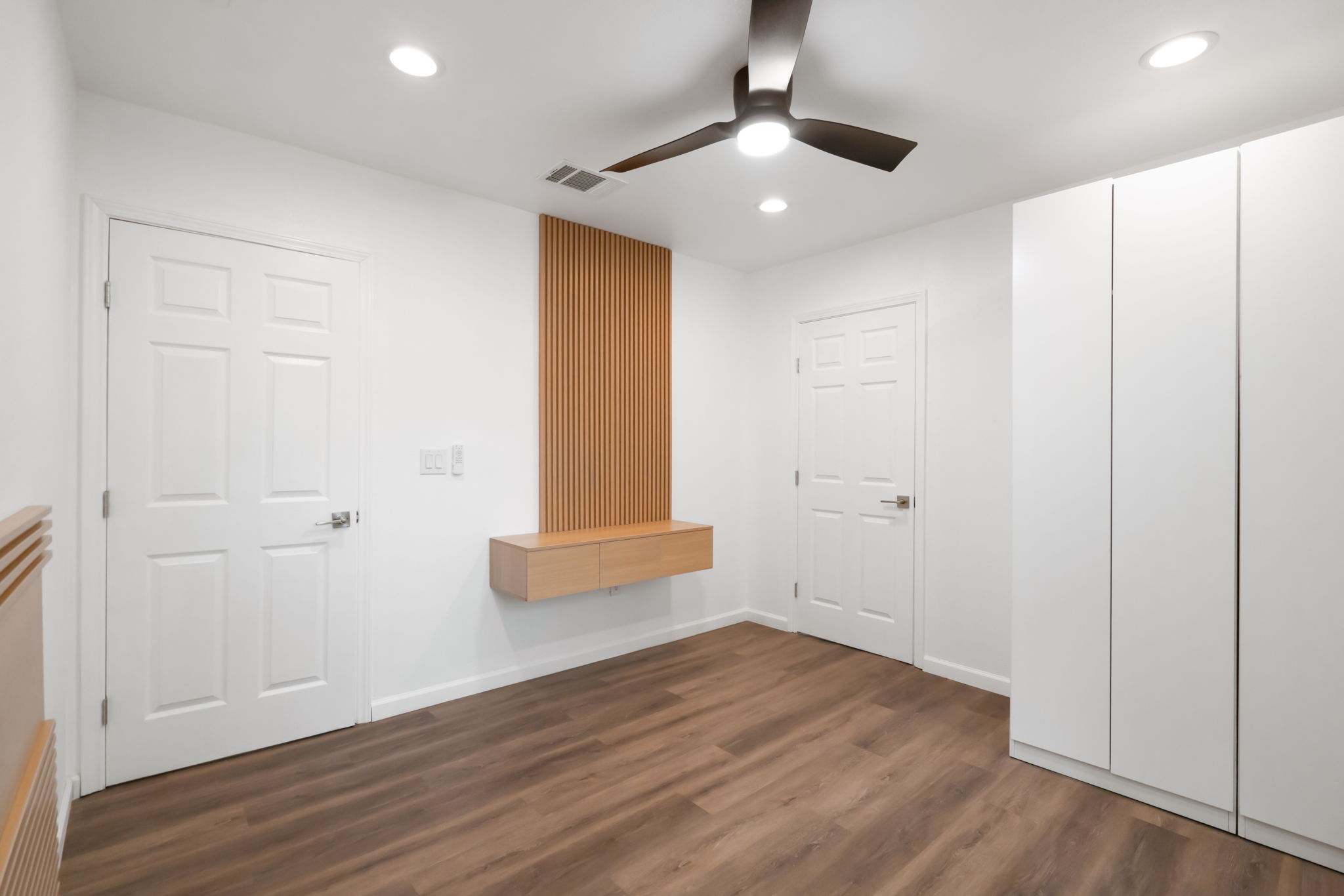 3501 Grayson Lane Austin, TX 78722 - Photo 11 of 23 an empty room with wooden floor and windows