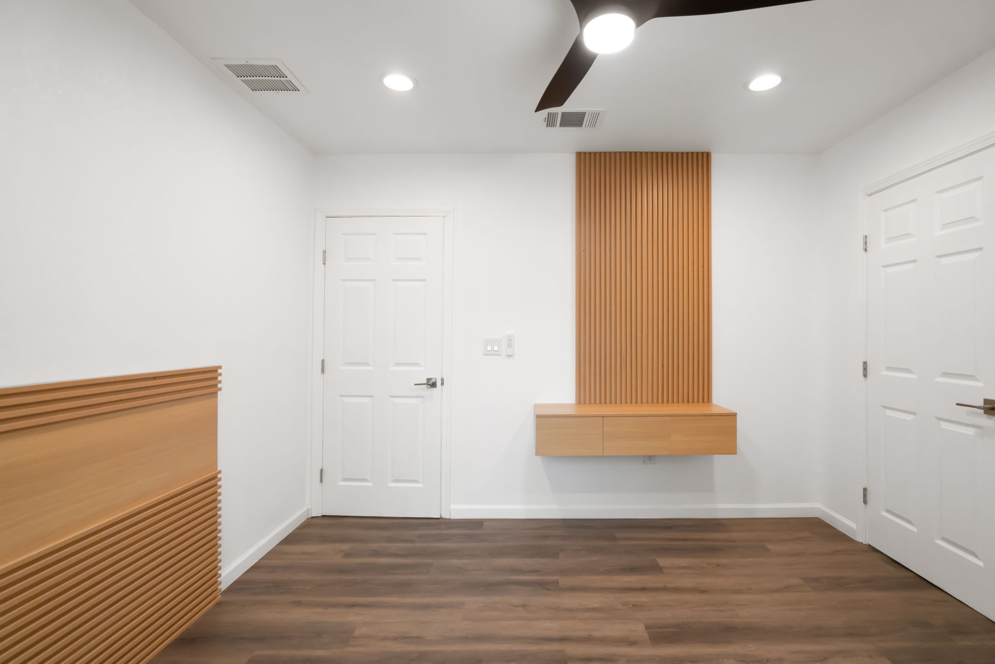 3501 Grayson Lane Austin, TX 78722 - Photo 12 of 23 a view of hallway with wooden floor