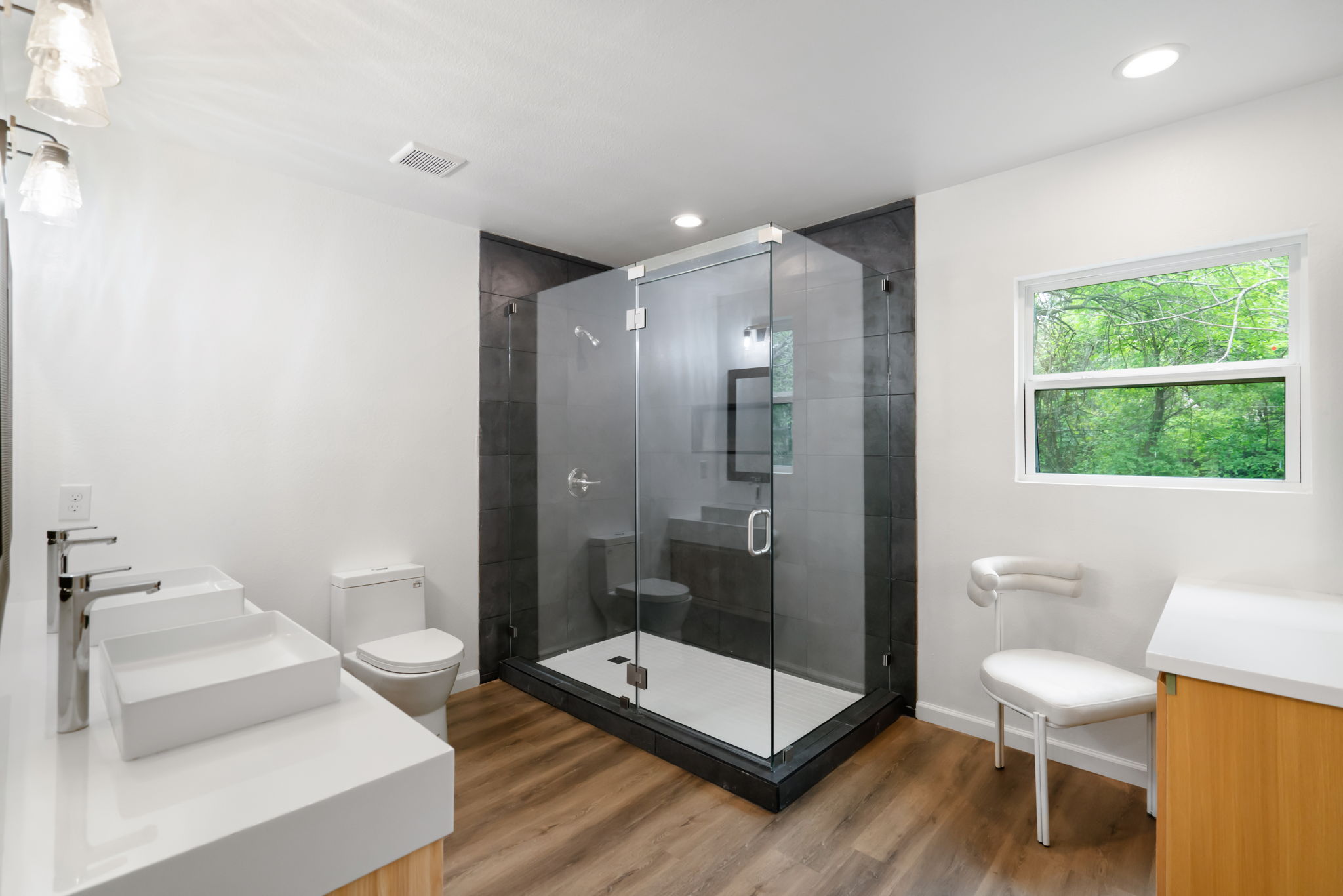 3501 Grayson Lane Austin, TX 78722 - Photo 13 of 23 a bathroom with a toilet a sink and shower