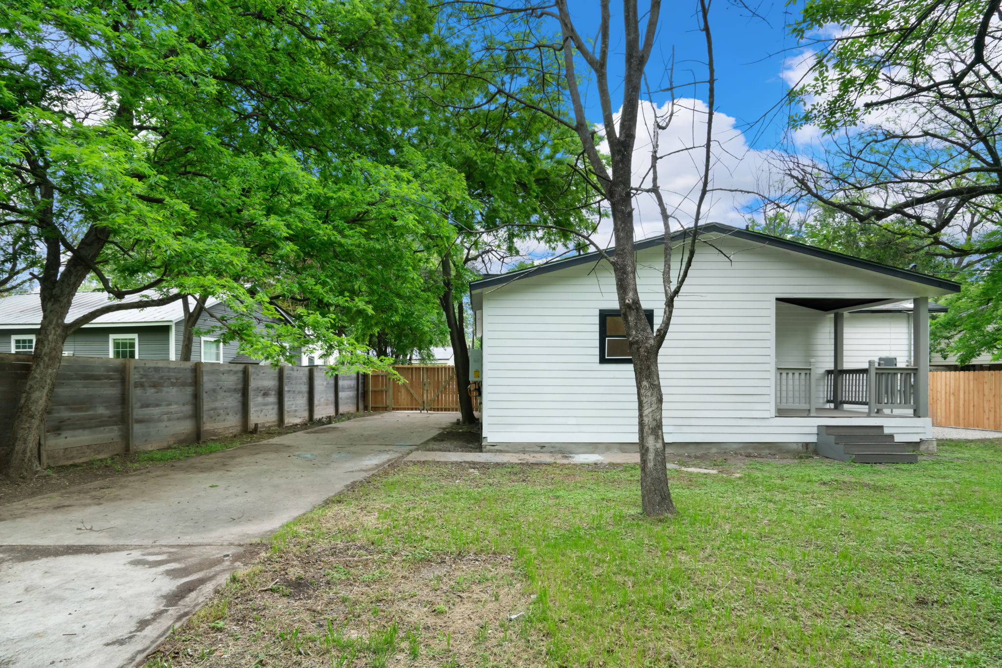 3501 Grayson Lane Austin, TX 78722 - Photo 21 of 23 a front view of a house with a yard and garage