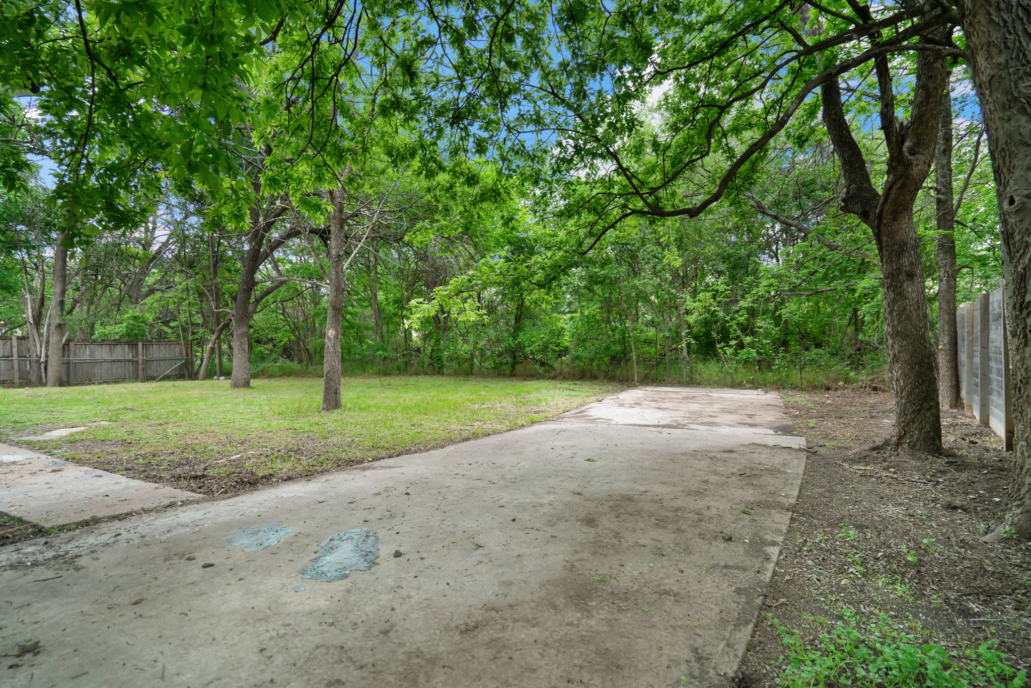 3501 Grayson Lane Austin, TX 78722 - Photo 22 of 23 a view of a field with trees in the background