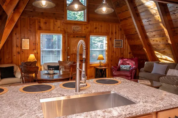 a kitchen with granite countertop sink and a granite counter tops